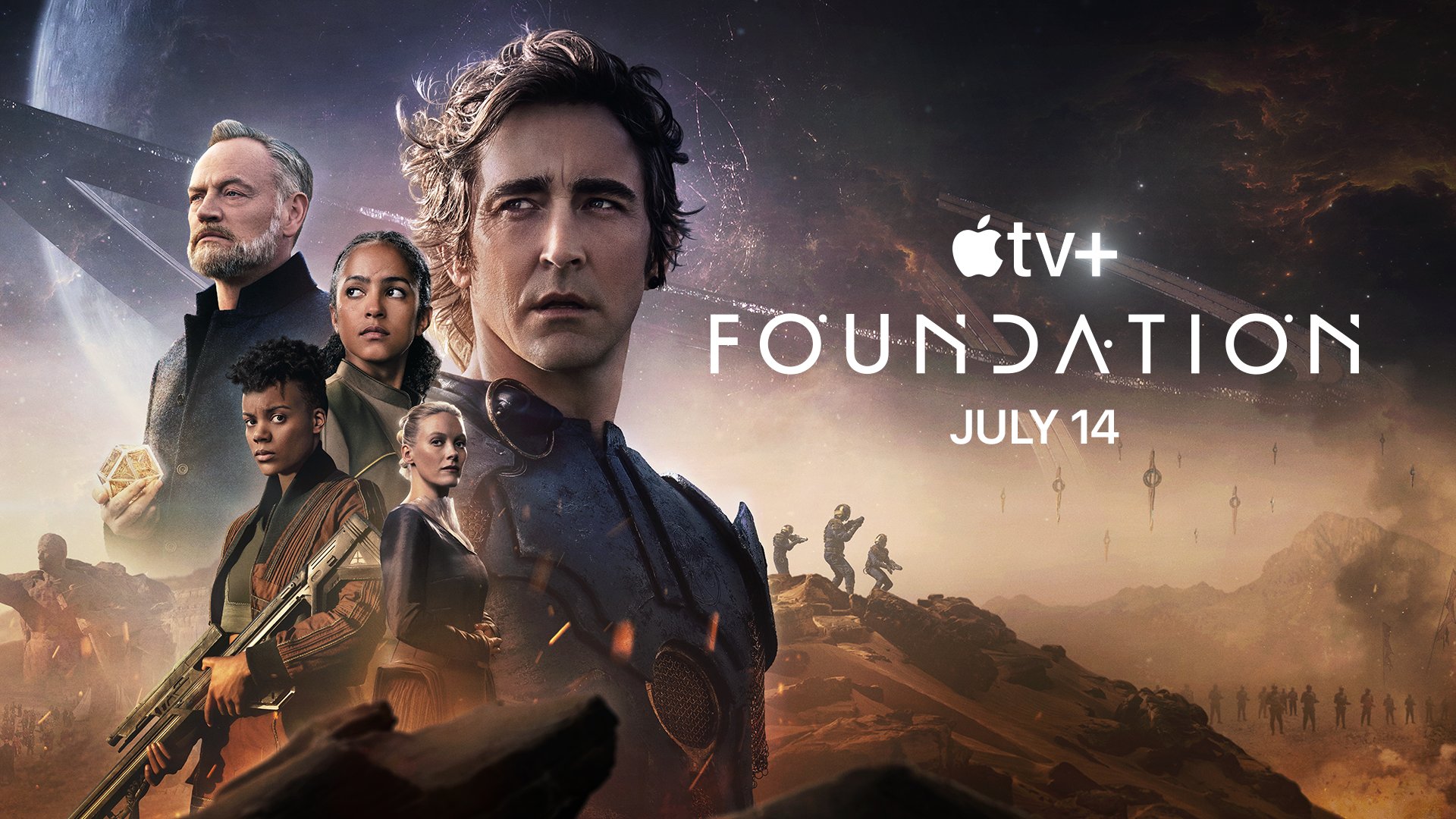 Pôster de divulgação da segunda temporada de Fundação, série da Apple TV+. Imagem mostra os personagens principais à frente e um fundo feito com montanhas rochosas e um céu com elementos do universo e com cores azul-marinho e marrom