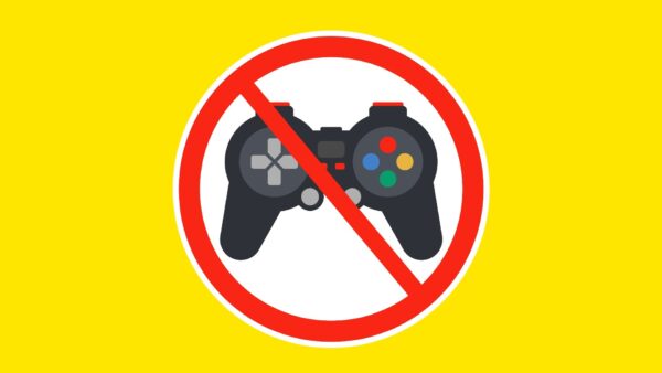 Imagem mostra um controle de videogame por trás do símbolo de proibição