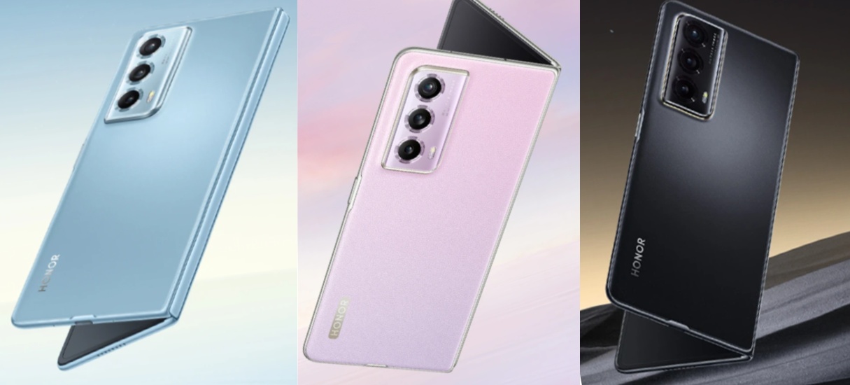 Imagem ilustrativa do smartphone dobrável Honor Magic VS2. A imagem mostra os smartphones semiabertos, nas três cores disponíveis: azul, lilás e preta